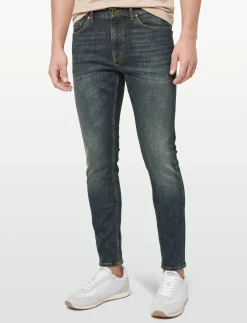 EVOLVE COMPASS - Tapered jeans