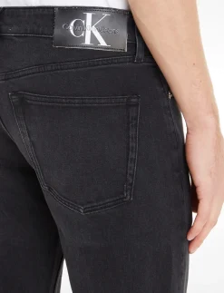 SLIM TAPER - Slim jeans
